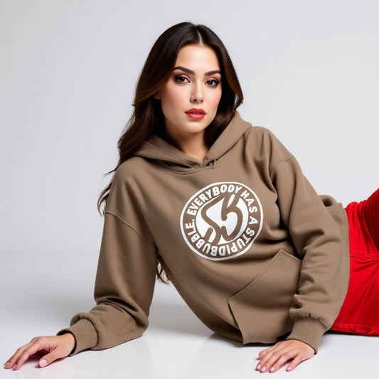 Woman wearing a brown hoodie with a logo and red pants on a white background